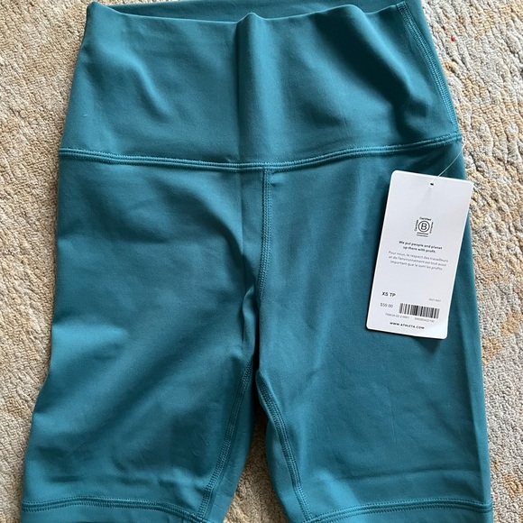 Brand NWT teal running shorts. - Picture 4 of 4